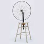 Bicycle wheel attached to a stool